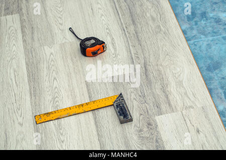 I pannelli di pavimento in parquet, laminato, il pavimento in legno e strumenti Foto Stock