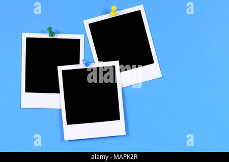 Blank Foto stampa imperniata alla carta blu. Foto Stock