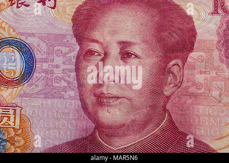 Close up di un centinaio di Yuan banconota con focus sul ritratto di statista cinese di Mao Tse-tung Foto Stock