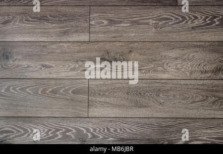 Grigio asse di legno/stecca lo sfondo con il grano di Nizza e si unisce a. Foto Stock