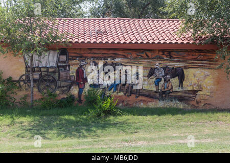 La pittura murale di cowboy godendo di chow tempo nel vecchio west in Turchia il Texas Foto Stock