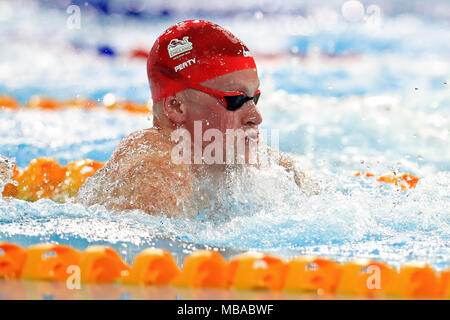 L'Inghilterra del Adam torbosi sul suo modo di argento nell'uomo 50m a rana al Gold Coast centro acquatico durante il giorno cinque del 2018 Giochi del Commonwealth in Gold Coast, Australia. Foto Stock