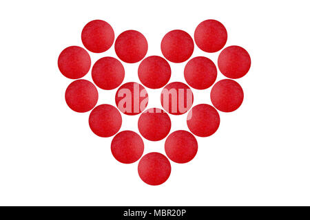 Le compresse di colore rosso a forma di cuore isolato su sfondo bianco. Foto Stock