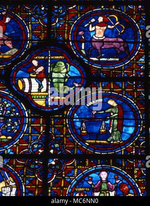 Dettagli dalla finestra zodiacale nella parete sud della cattedrale di Chartres, Francia. Foto Stock