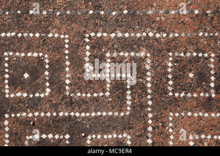 Roman swastika pavimento a mosaico in la casa di abitazione in Paestum, Campania, Italia. Foto Stock