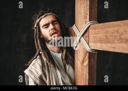 Gesù Cristo con Crocifissione su sfondo nero Foto Stock