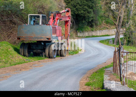 Costruzione strada carrello parcheggiato in campagna. Foto Stock