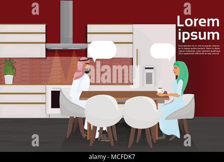 Arab paio di bere il caffè seduti a tavola nella cucina moderna camera illustrazione vettoriale Illustrazione Vettoriale