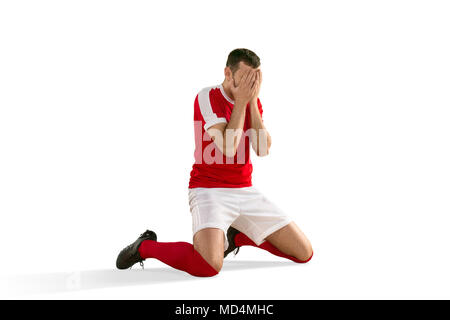 Calcio infelice o giocatore di calcio con Palm sul suo volto Foto Stock