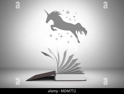 Unicorn silhouette con stelle saltando su Libro magico Foto Stock