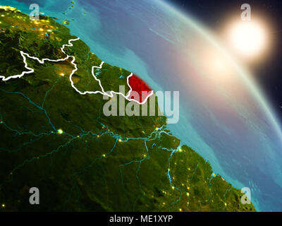Tramonto al di sopra della Guyana francese dallo spazio sul pianeta Terra con visibili i confini del paese. 3D'illustrazione. Gli elementi di questa immagine fornita dalla NASA. Foto Stock