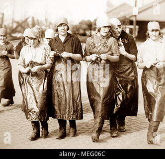 Scottish fisher ragazze (aringa grondaie e imballatori), Great Yarmouth, agli inizi del novecento Foto Stock