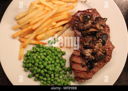 La bistecca e il chip per la cena Foto Stock