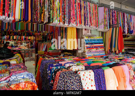 Soai quello dei Kinh tessuto Lam Mercato, Chinatown business, Ho Chi Minh City; Saigon Vietnam; Foto Stock