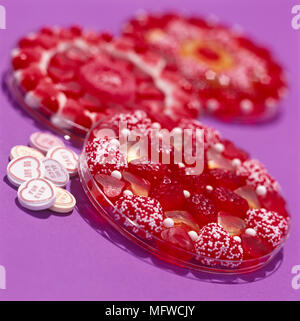 Amore cuore dolci e red caramelle gommose Foto Stock