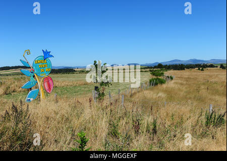 Un segno sulla strada per la città di Le Puy-en-Velay pubblicità Le Puy lenticchie verdi, Haute Loire, Francia Foto Stock