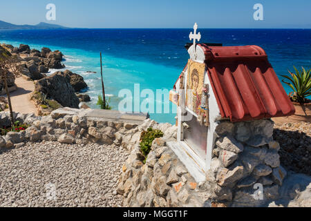 Un greco-ortodossi santuario sul litorale del Mar Egeo sull isola di Rodi (Rhodes, Grecia) Foto Stock