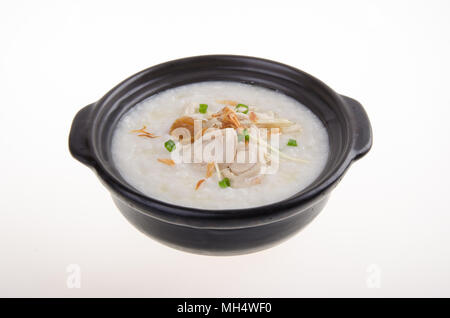 Porridge, abalone & Pollo Porridge (congee) servita in claypot Foto Stock