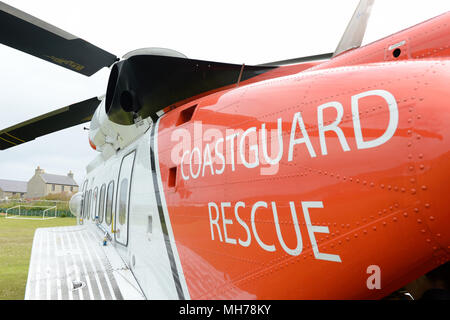 Insegne su un REGNO UNITO Coast Guard Salvataggio in elicottero del Maritime Coastguard Agency Foto Stock