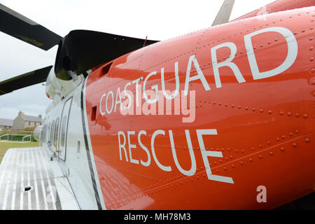 Insegne su un REGNO UNITO Coast Guard Salvataggio in elicottero del Maritime Coastguard Agency Foto Stock