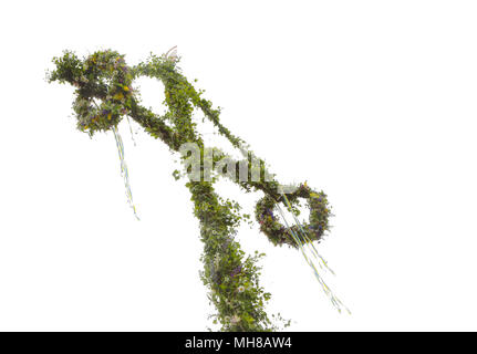 In alto di un verde comune svedese tradizionale maypole, utilizzato per la festa di mezza estate i festeggiamenti della vigilia. Foto Stock