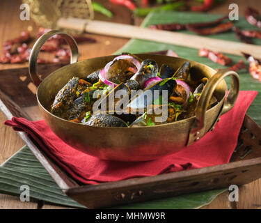 Cozze masala. Crostacei curry. India cibo Foto Stock