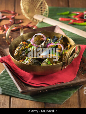 Cozze masala. Crostacei curry. India cibo Foto Stock