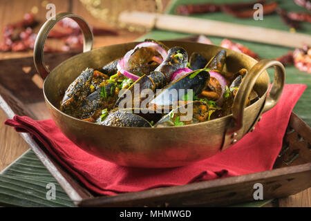 Cozze masala. Crostacei curry. India cibo Foto Stock