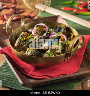 Cozze masala. Crostacei curry. India cibo Foto Stock