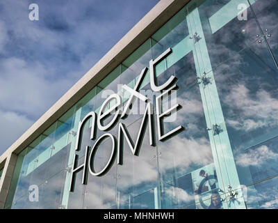 2 febbraio 2018: York, North Yorkshire, Regno Unito - Next Home logo e segno sulla parte anteriore del negozio a York Vangarde Shopping Park. Foto Stock