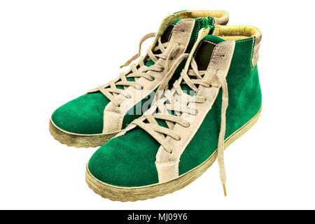 Glamorous teen verde gumshoes scamosciata isolati su sfondo bianco Foto Stock