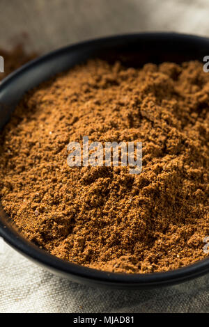 Organici di Garam Masala Indian Spice in una ciotola Foto Stock