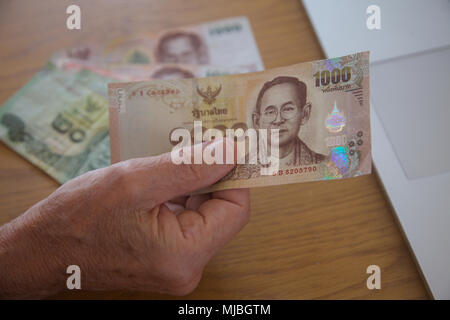 Close up di un Thai baht 1000 nota. Foto Stock