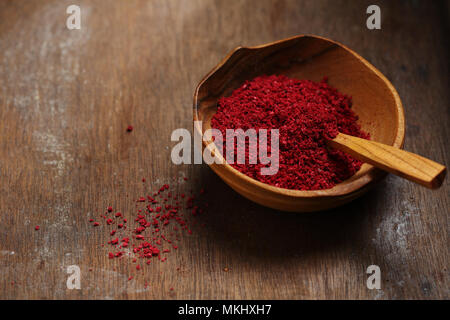 Sommacco organico spice in ciotola, cibo closeup Foto Stock