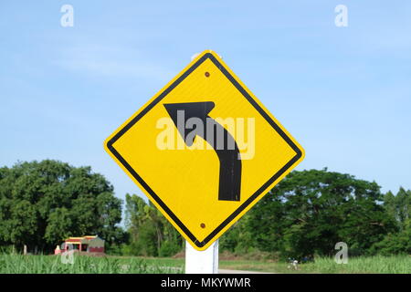 A sinistra freccia curva traffico di simbolo Foto Stock