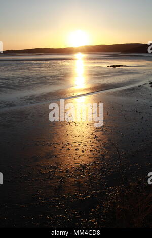 Tramonto sulla baia di Morecambe lancashire a bassa marea Foto Stock