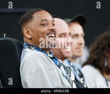 Attore americano Will Smith sorridente mentre si guarda la partita di tennis in Australian Open 2018, Melbourne Park, Melbourne, Victoria, Australia. Foto Stock