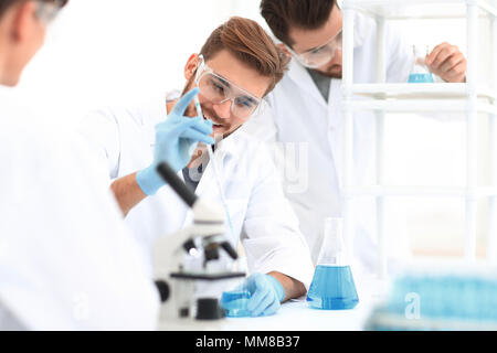 Immagine di sfondo per la squadra di scienza in laboratorio Foto Stock