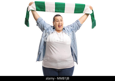 Overjoyed femmina ventola sportive azienda una sciarpa isolati su sfondo bianco Foto Stock