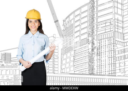 Una giovane donna architetto azienda blueprint costruzione edilizia ufficio del sito Foto Stock