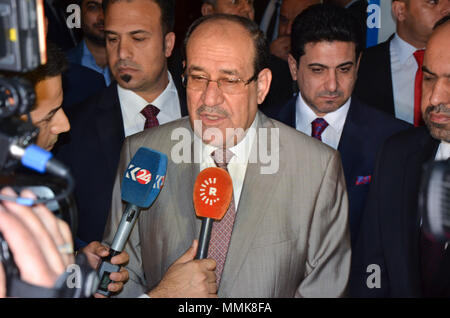 Baghdad in Iraq. Il 12 maggio 2018. In Iraq le Vice Presidente Nuri al-Maliki parla ai media dopo la colata scrutinio a Bagdad, capitale dell'Iraq, 12 maggio 2018. Iraq ha tenuto elezioni parlamentari il sabato. Credito: Cheng Shuaipeng/Xinhua/Alamy Live News Foto Stock