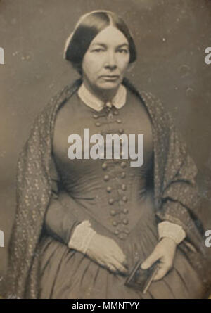 . 'Un daguerreotype Ritratto di signora seduto, tenendo un piccolo album o daguerreotype caso nella sua mano sinistra, indossando un anello di nozze sul suo dito e uno scialle modellato sulle sue spalle, con gennaio 17th, 1852 graffiato lungo la parte inferiore sinistra perimetro dove la piastra incontra il tappetino e nuovamente graffiato lungo angoli inferiori destro e sinistro sotto il tappetino, Cooley Springfield timbro su mat' 8 1852 donna ritratto byCooley Springfield Foto Stock