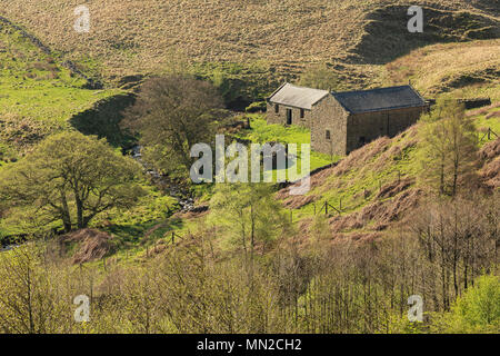 Un'immagine di azienda abbandonata edifici del Peak District, Derbyshire, England, Regno Unito Foto Stock