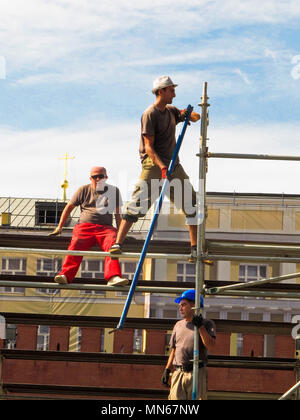 Operai nei ponteggi. La Piazza Rossa. Moscu. La Russia Foto Stock
