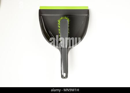Pennello grigio e scoop per la pulizia Foto Stock