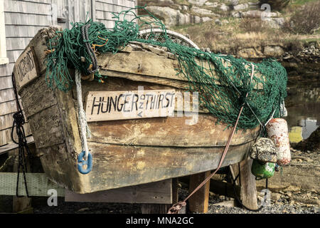 Vecchia barca da pesca denominata 'fame e sete" a Peggy's Cove, Nova Scotia, Canada. Foto Stock