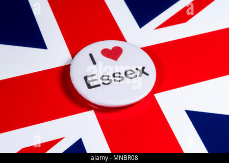 LONDON, Regno Unito - 27 APRILE 2018: un amo Essex il badge nella foto sopra la bandiera del Regno Unito, il 27 aprile 2018. Foto Stock