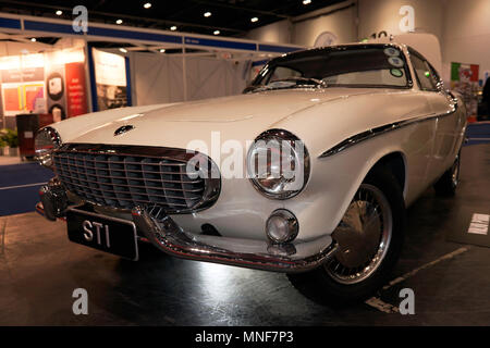 L'originale, completamente restaurato, 1961 Volvo P1800 che è stato utilizzato da Roger Moore nella serie TV di "Santo", al 2018 London Classic Car Show Foto Stock