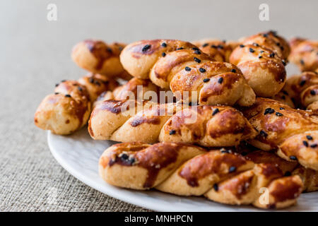 Turco biscotti salati con cumino nero / Burgu Kurabiye. I cibi tradizionali. Foto Stock