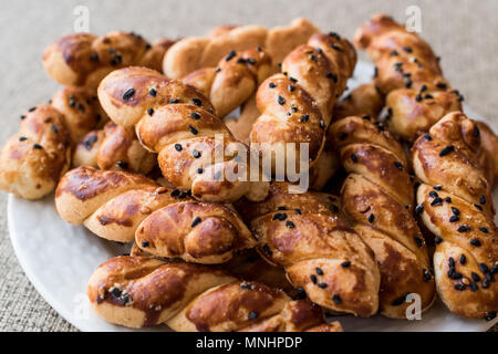 Turco biscotti salati con cumino nero / Burgu Kurabiye. I cibi tradizionali. Foto Stock